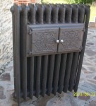 Radiateur en fonte ancien fleuri decoré rococo chauffe plat